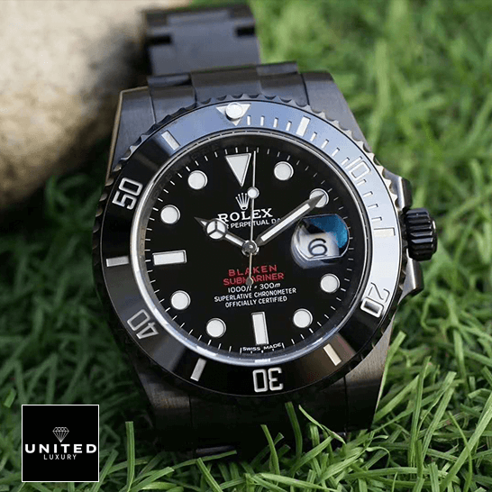rolex_blaken_submariner_date_singel_red_black_dial_natural_front