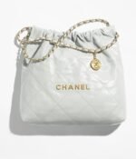 CHANEL 22 HANDBAG Shiny Calfskin & Gold-Tone Metal Light white/cream