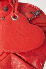 BALENCIAGA Le Cagole XS studded crinkled-leather shoulder bag red - Image 4
