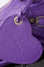 BALENCIAGA Le Cagole XS studded crinkled-leather shoulder bag purple - Image 4