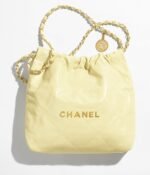 CHANEL 22 SMALL HANDBAG Calfskin & Silver Metal Yellow
