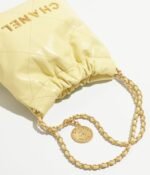 CHANEL 22 MINI HANDBAG Shiny Calfskin & Gold-Tone Metal Light Yellow - Image 3